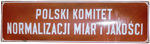 Tablica Polski Komitet Normalizacji Miar i Jakości - biały napis na czerwonym tle - zdjęcie